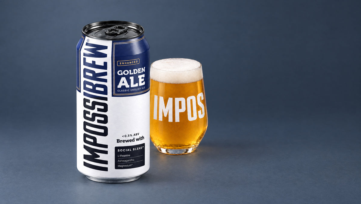 IMPOSSIBREW Golden Ale can and Signature Glass against a blue-grey studio background